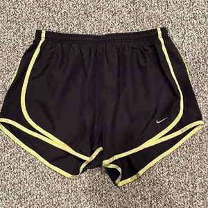 Nike athletic shorts, black and yellow size L